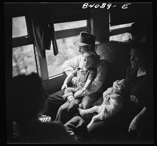 Children of migrants en route to upper New York state to work in the harvest