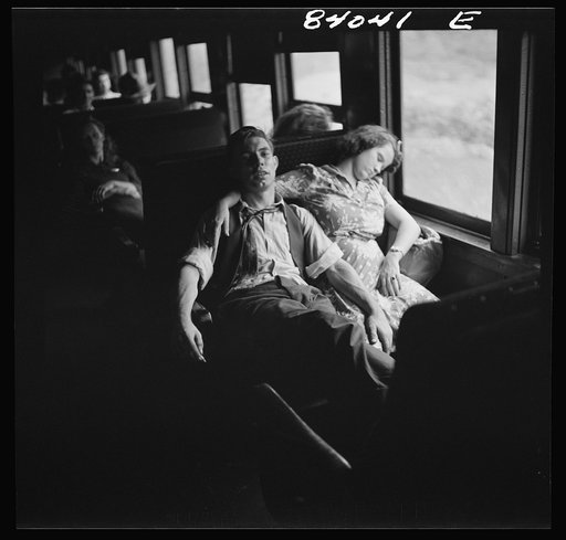 Boy and girl from Richwood, West Virginia en route to upper New York state to work in the harvest