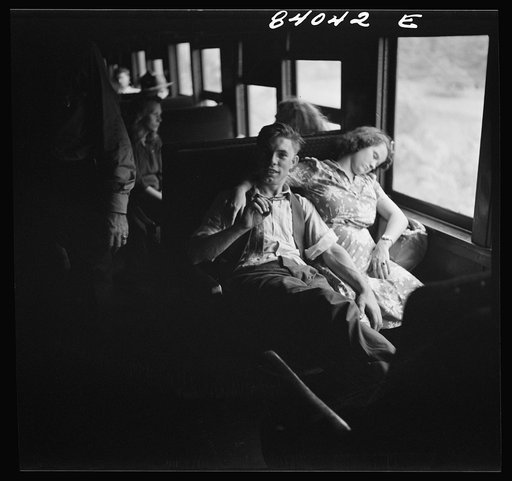 Untitled photo, possibly related to: Boy and girl from Richwood, West Virginia en route to upper New York state to work in the harvest
