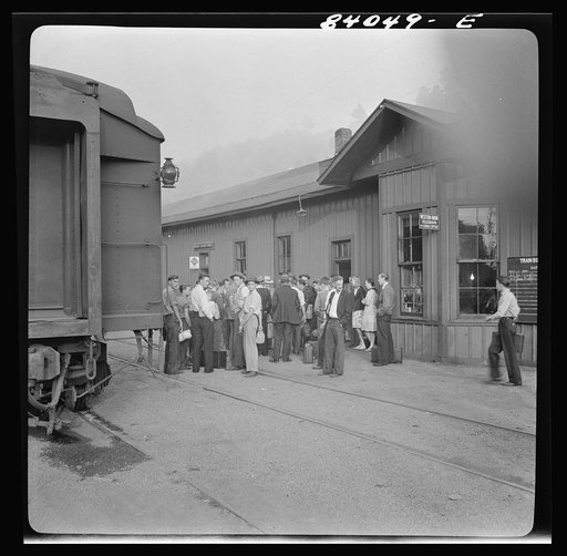 Untitled photo, possibly related to: Richwood, West Virginia. Station scene at departure of men to help in the harvest in upper New York state