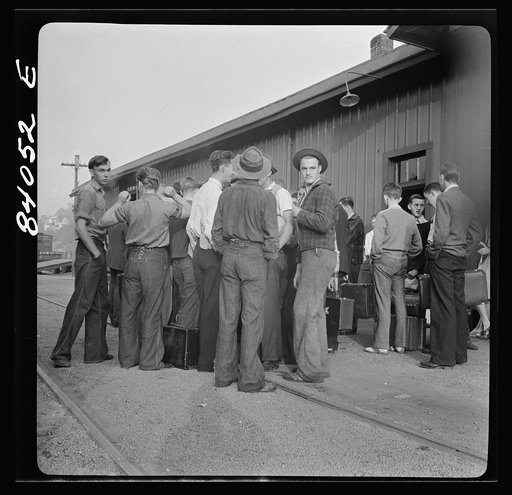 Richwood, West Virginia. Station scene at departure of men to help in the harvest in upper New York state