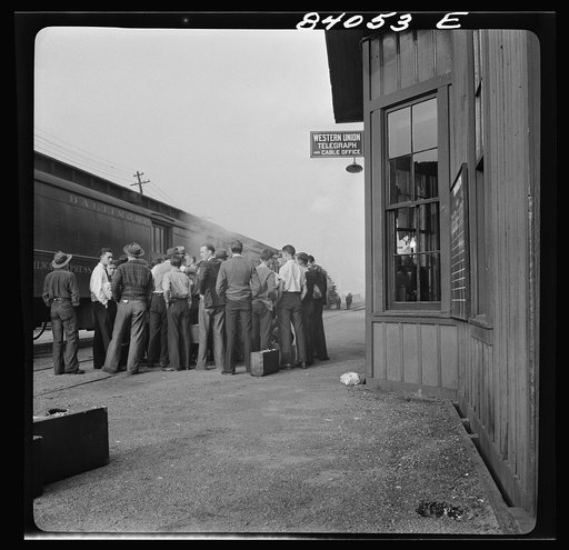 Richwood, West Virginia. Station scene at departure of men to help in the harvest in upper New York state