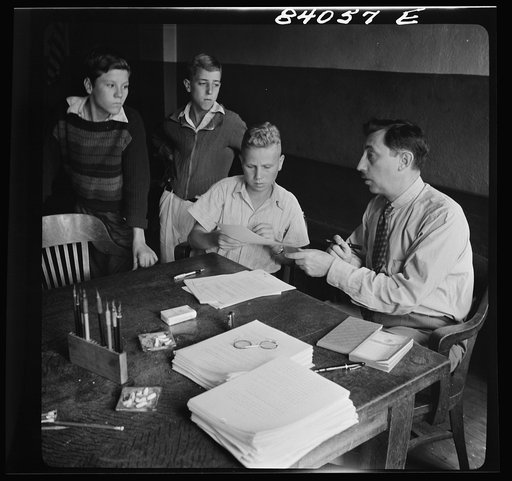 Richwood, West Virginia. FSA (Farm Security Administration) representative signing up high school boys to go by special train to upper New York state to help bring in the harvest