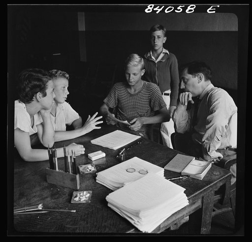 Richwood, West Virginia. A high school boy who is slightly under age is trying to convince the FSA (Farm Security Administration) representative that he should go to New York state to help bring in the harvest