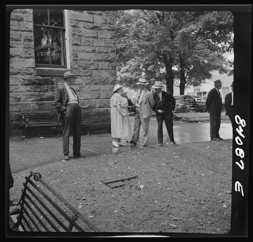 Untitled photo, possibly related to: Summersville, West Virginia. Gossiping in the courthouse square