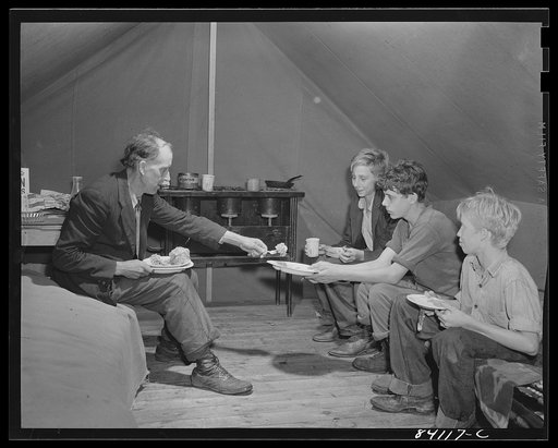 Batavia, New York. Three boys, all sixteen years old, and William B. Sloan who is looking out for the boys while they work in the harvest. They will return to school later in the year