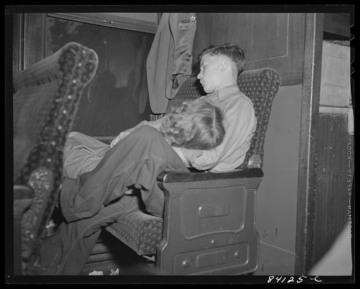 Boy and girl, en route to Batavia, New York from Richwood West Virginia to upper New York state to work in the harvest
