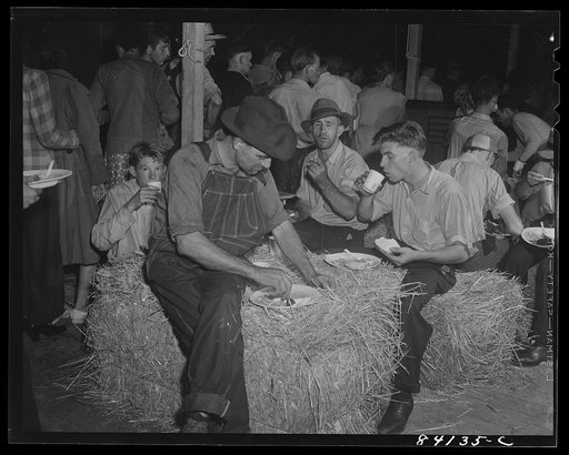 Batavia, New York. Elba FSA (Farm Security Administration) farm labor camp. The Red Cross serving migrants from West Virginia their first hot meal since leaving home