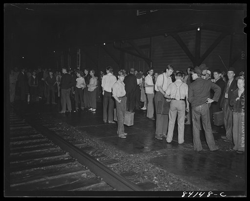 Batavia, New York. West Virginia migrants arriving in a drizzling rain