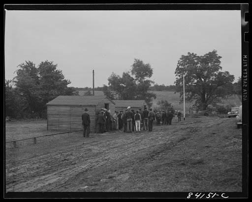 Batavia, New York. Elba FSA (Farm Security Administration) farm labor camp. West Virginia workers waiting outside the United States employment service office