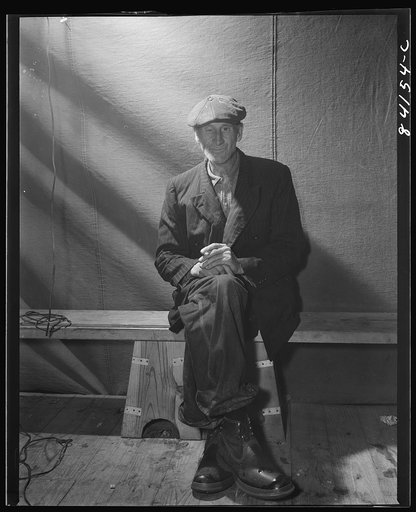 Batavia, New York. Elba FSA (Farm Security Administration) farm labor camp. An old man who has lived all of his life near Broadway, New York City, and who was taken off relief and sent to the Elba FSA camp to work in the harvest. He said, "There is so much suffering in the world today that mine does