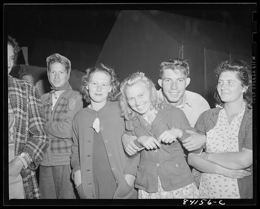 Batavia, New York. Elba FSA (Farm Security Administration) farm labor camp. Boys and girls from West Virginia., who came to upper New York state to help in the harvest. Boy in the center said, "Please take my picture now; I want the world to see me when I am happy!"