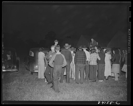 Untitled photo, possibly related to: Batavia, New York. Elba FSA (Farm Security Administration) farm labor camp. Groceries being distributed among the migrants on the second evening after their arrival