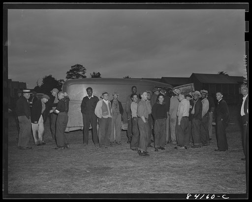 Untitled photo, possibly related to: Batavia, New York. Elba FSA (Farm Security Administration) farm labor camp. Traveling grocer who did a rushing business selling bread and cold meats to the migrants