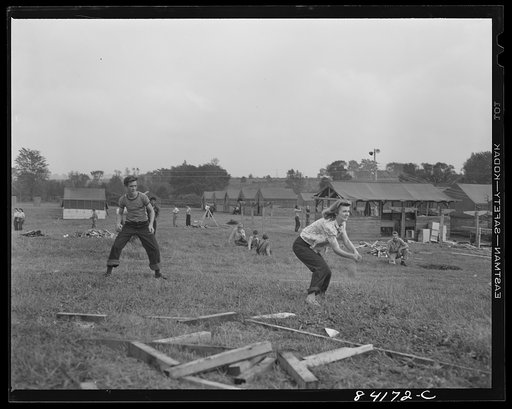 Batavia, New York. Elba FSA (Farm Security Administration) farm labor camp. Despite rain and empty stomachs, the boys and girls just off the train from West Virginia started a ball game