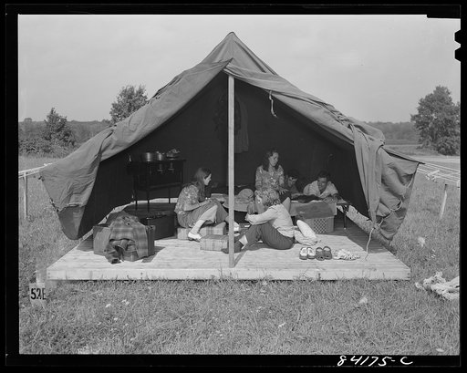 Batavia, New York. Elba FSA (Farm Security Administration) farm labor camp. Boys and girls from Richwood, West Virginia settling themselves into their tent home
