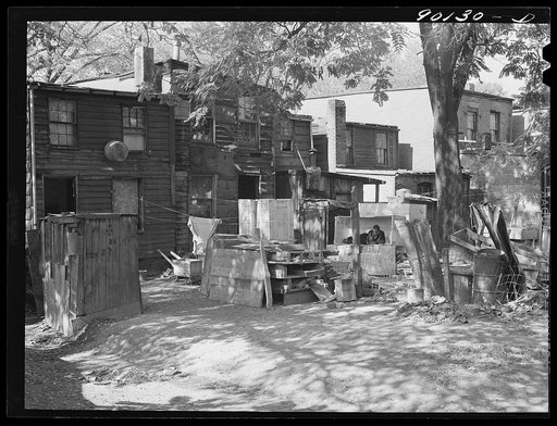 Negro slum area between D and C Streets off 1st Street, S.W. Washington, D.C. Most houses have five small rooms renting for twenty dollars and fifty cents a month, with rear wood kitchen shed, cold water, outdoor privy