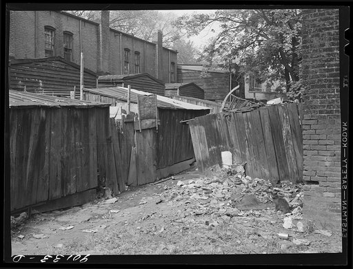 Negro slum area between D and C Streets off 1st Street, S.W. Washington, D.C. Most houses have five small rooms renting for twenty dollars and fifty cents a month, with rear wood kitchen shed, cold water, outdoor privy