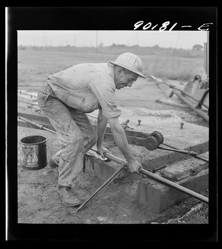 Servicing an old oil well near Wichita, Kansas
