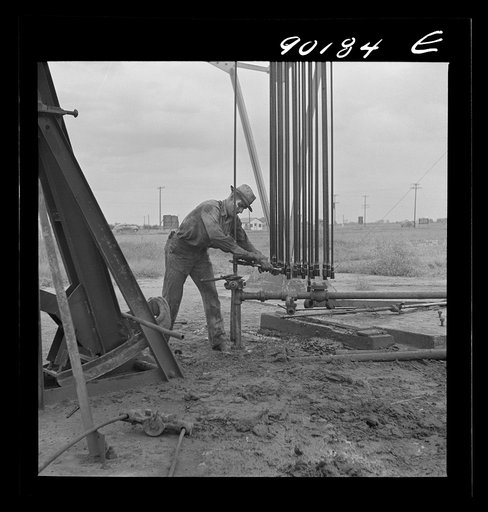 Servicing and old oil well near Wichita, Kansas