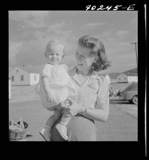 Untitled photo, possibly related to: Mrs. B.M. Henderson, wife of defense worker, and daughter, who live in Sunset Village. FSA (Farm Security Administration) project. Radford, Virginia