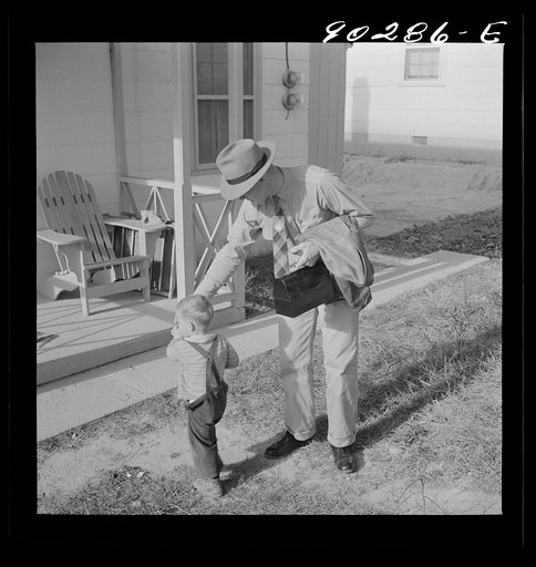 Radford, Virginia. Fred B. Williams from Savannah, Georgia, a safety engineer at the power plant, leaving his home to go to work. Sunset Vvillage, a FSA (Farm Security Administration) project for defense workers