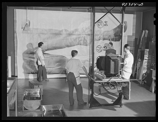 Washington, D.C. Preparing the defense bond sales photomural to be installed in the Grand Central terminal, New York, in the photographic laboratory of the FSA (Farm Security Administration). Finished print tacked to enlarging easel to show size