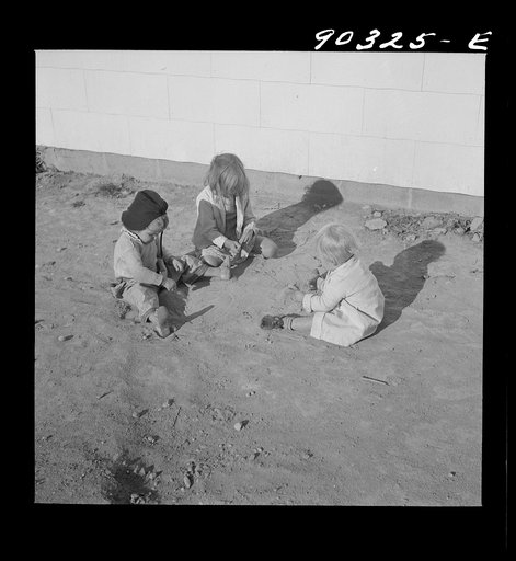Children of defense workers playing outside their homes in Sunset Village. Radford, Virginia. FSA (Farm Security Administration) project