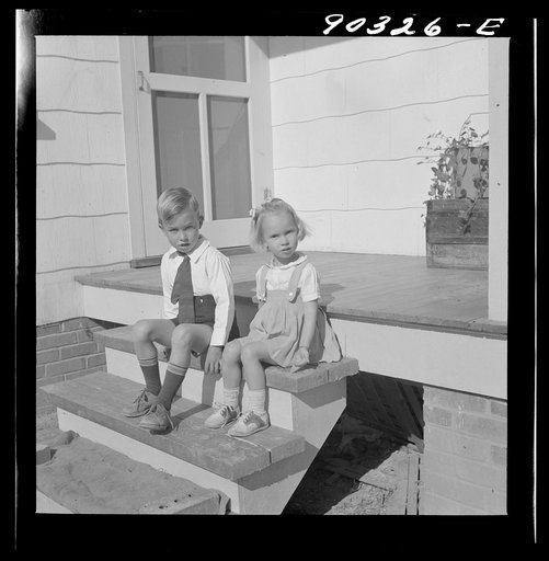 Elsie, Marie, and Howard Jr., children of Mr. Howard H. Smith from Galax, Virginia who live in new rural home built by FSA (Farm Security Administration) on J.T. Nolley's property. Riner Virginia, near Radford
