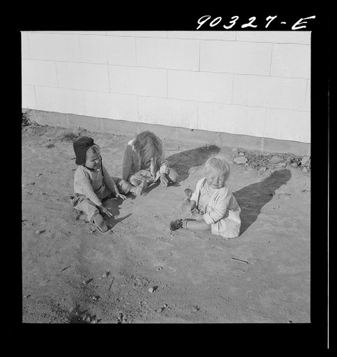 Untitled photo, possibly related to: Children of defense workers playing outside their homes in Sunset Village. Radford, Virginia. FSA (Farm Security Administration) project