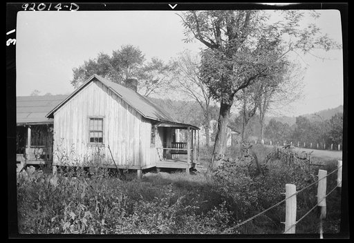 Eleanor, West Virginia. House of tragedy near Red House farms. The house was formerly occupied by a mine foreman who, while intoxicated, attacked his wife. The son killed his father. This is a typical miner section