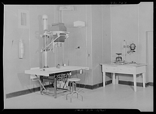 U.S. FSA (Farm Security Administration), later U.S. Office of War Information, photograph laboratory in the Auditor's Building. Washington, D.C. Enlarging room, showing, a Saltzman 8x10 enlarger on the left, and a Leitz 35mm enlarger on the right