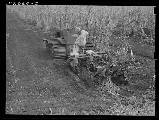 Untitled photo, possibly related to: Tractor-driven combination bean planter and fertilizer used on large tracts of farmlands around Lake Okeechobee and Clewiston, Florida