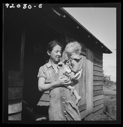 Untitled photo, possibly related to: Migrant laborer's wife and child. She is thirty-two years old has had eleven children. See 51187-E. Belle Glade, Florida