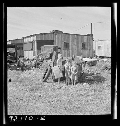 Untitled photo, possibly related to: Migrant laborers children living in overcrowded camps with very bad sanitary conditions. Belle Glade, Florida