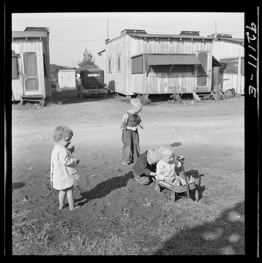 Untitled photo, possibly related to:  Migrant laborers children living in overcrowded camps with very bad sanitary conditions. Belle Glade, Florida
