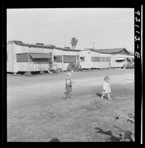 Untitled photo, possibly related to:  Migrant laborers children living in overcrowded camps with very bad sanitary conditions. Belle Glade, Florida
