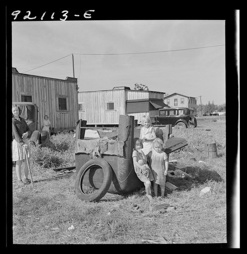 Untitled photo, possibly related to: Migrant laborers children living in overcrowded camps with very bad sanitary conditions. Belle Glade, Florida