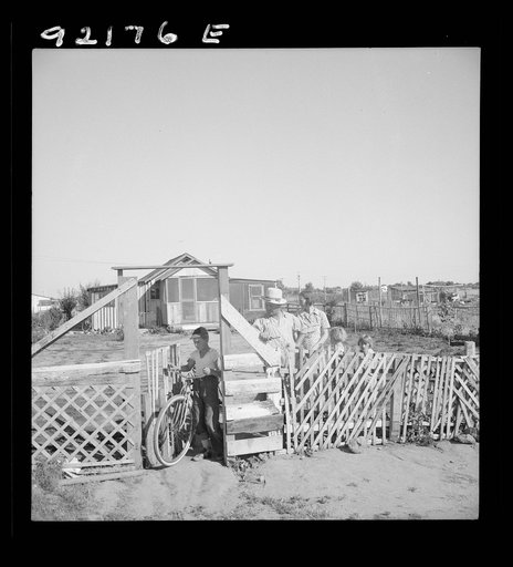 Untitled photo, possibly related to: Highway City, California, near Fresno. See general caption. Family from Oklahoma; have been in California for six years, have been migratory workers now on Works Progress Administration (WPA) from which they may be cut off at the opening of the 1939 harvest. Thei