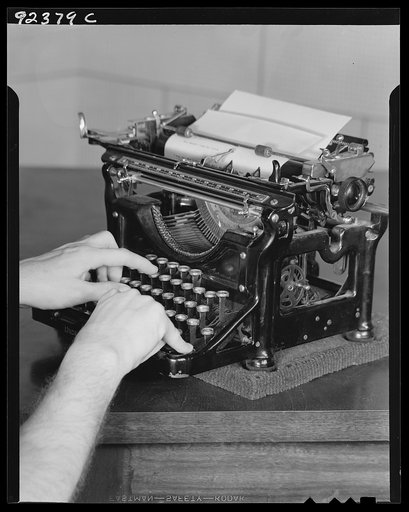 Untitled photo, possibly related to: Typewriter used in information work. United States Department of Agriculture (USDA). Washington, D.C.