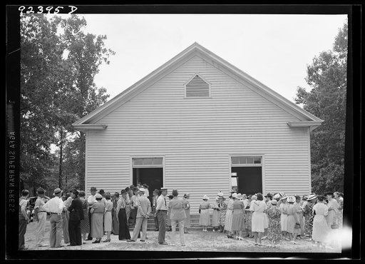 Untitled photo, possibly related to: Congregation gathers in groups to talk after services are over. Wheeley's Church, Person County, North Carolina