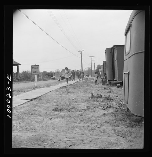 Untitled photo, possibly related to: Arlington, Virginia. FSA (Farm Security Administration) trailer camp project for Negroes. The project is situated right next to a school