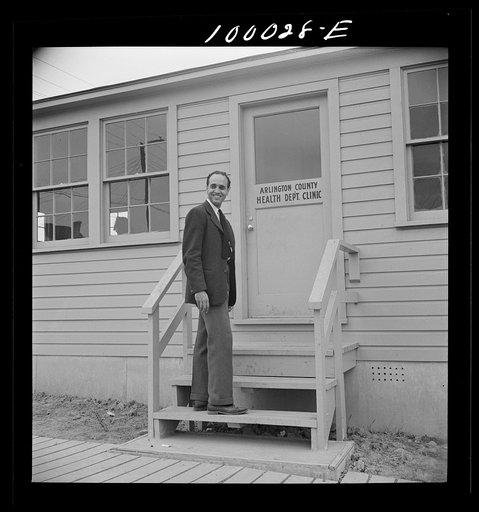 Arlington, Virginia. FSA (Farm Security Administration) trailer camp project for Negroes. Manager of the project outside the clinic in the community building