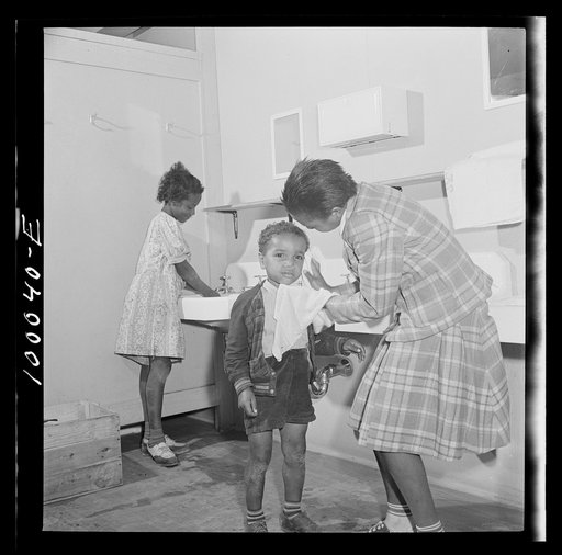 Arlington, Virginia. FSA (Farm Security Administration) trailer camp project for Negroes. Washing facilities in the community building