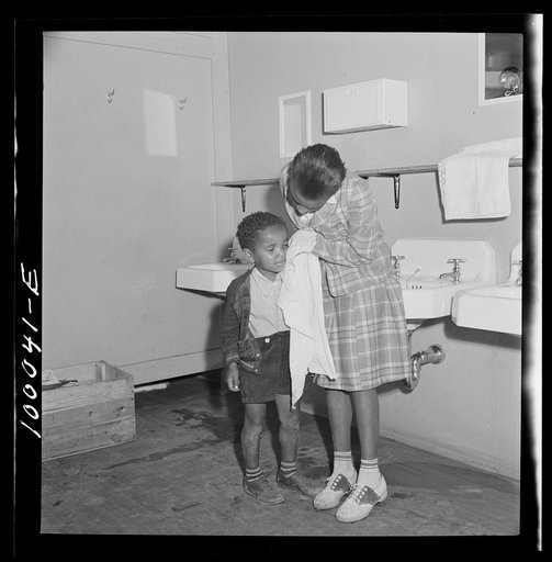 Untitled photo, possibly related to: Arlington, Virginia. FSA (Farm Security Administration) trailer camp project for Negroes. Washing facilities in the community building