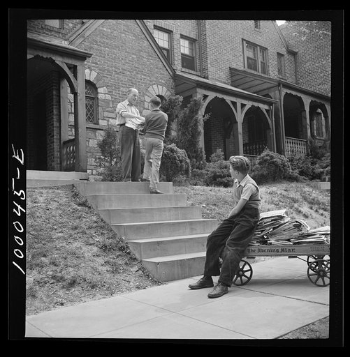 Washington, D.C. Salvage drive, Victory Program. Schoolboy volunteers to go from house to home collecting scrap paper