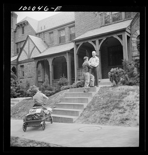 Untitled photo, possibly related to: Washington, D.C. Salvage drive, Victory Program. Schoolboy volunteers to go from house to home collecting scrap paper