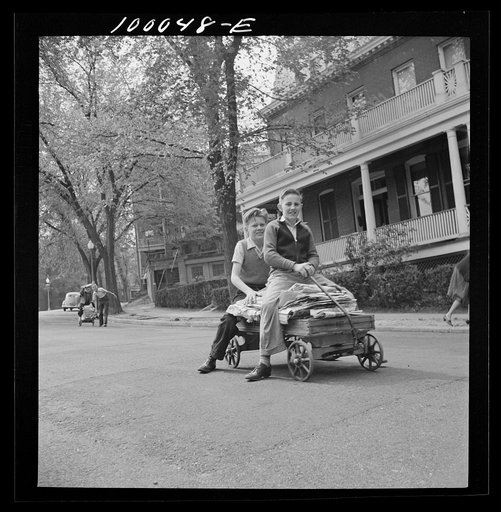 Untitled photo, possibly related to: Washington, D.C. Salvage drive, Victory Program. Schoolboy volunteers to go from house to home collecting scrap paper