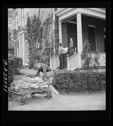 Untitled photo, possibly related to: Schoolboys go voluntarily from house to house collecting scrap paper in connection with the campaign in the District schools. Washington, D.C.