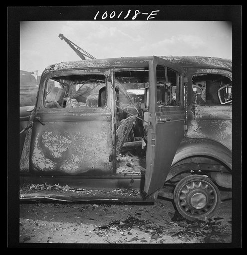 Washington, D.C. Scrap salvage campaign, Victory Program. Metal skelton of an old car which has been burned in order to get rid of useless materials after being stripped of saleable parts at the wholesale junkyard